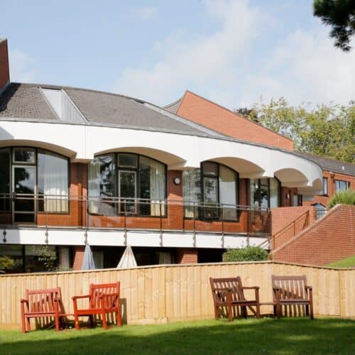 Main building and gardens at Cadogan Court