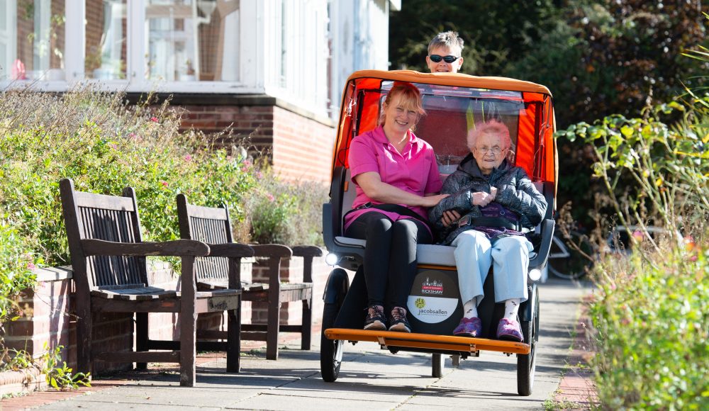 Resident on tricycle at Cornwallis Court