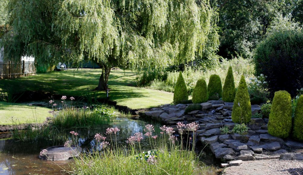 Pond and gardens at The Tithebarn