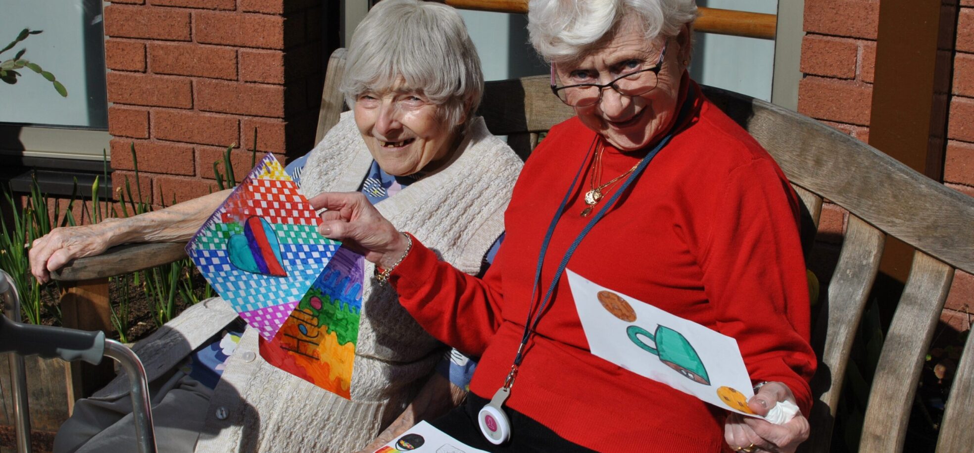 Residents read messages from the local community at Cadogan Court
