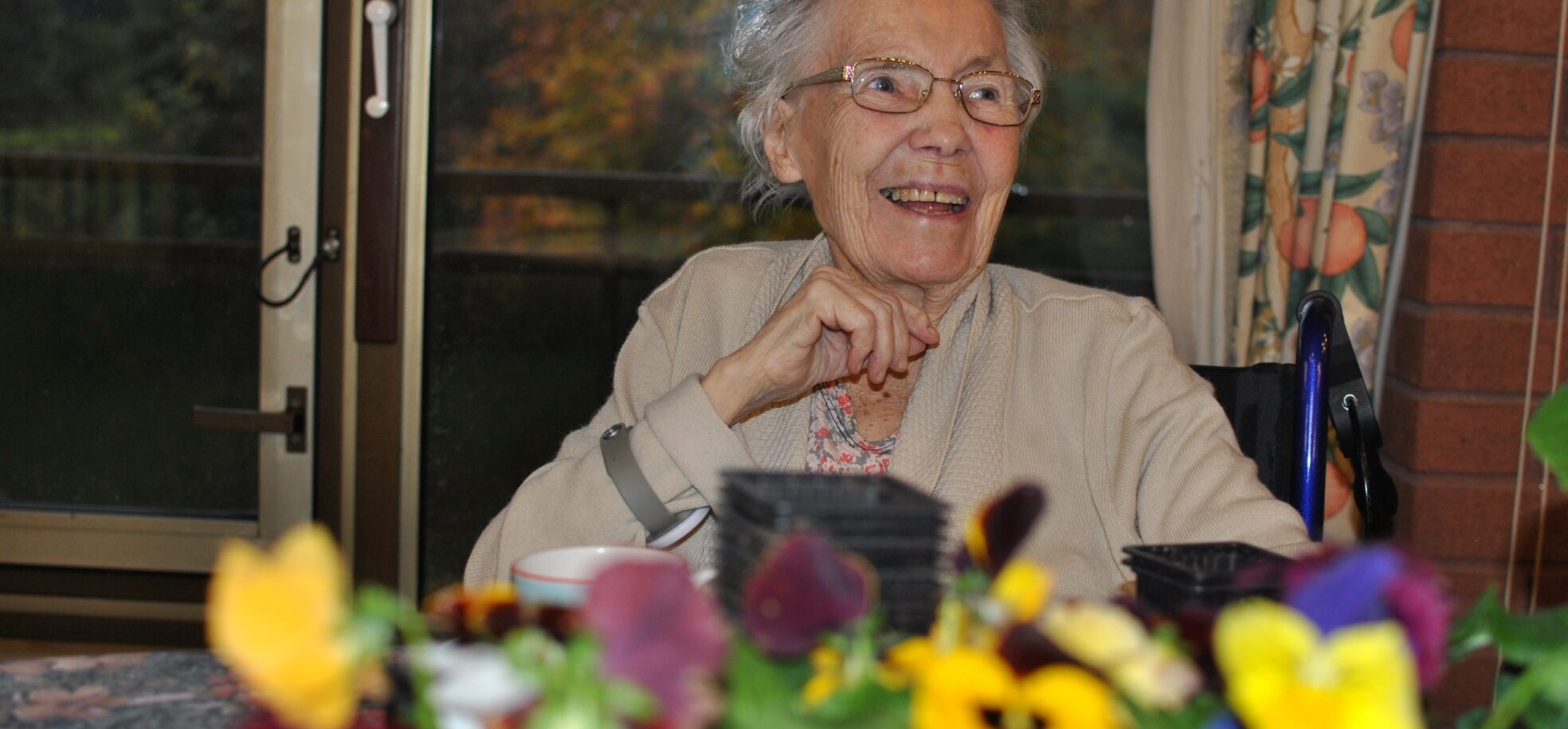 Cadogan Court resident enjoying some winter gardening at the Home in Exeter