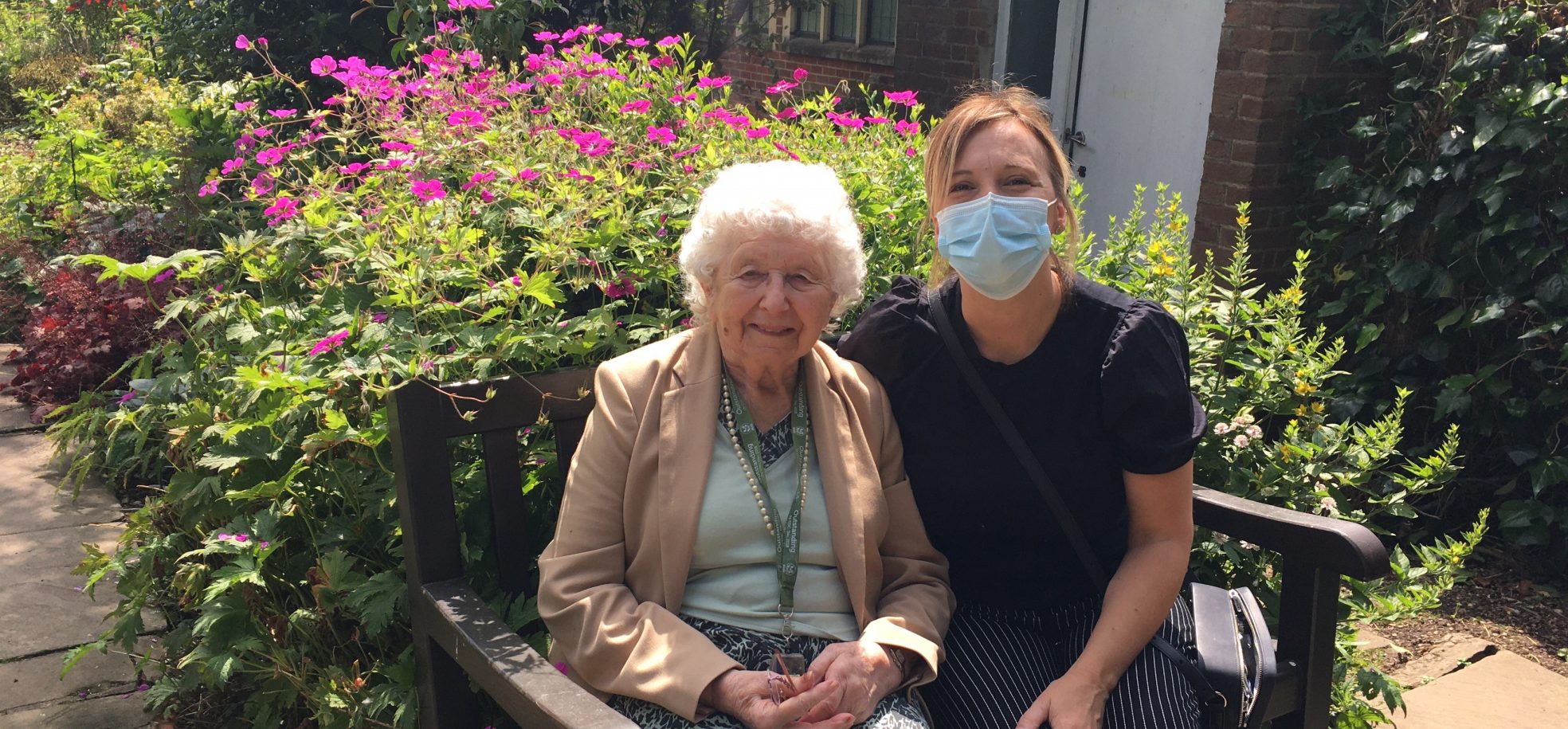Resident Jill Holbrook enjoys the outdoors with Tracy Lydon, one of the Home’s Activities Coordinators.