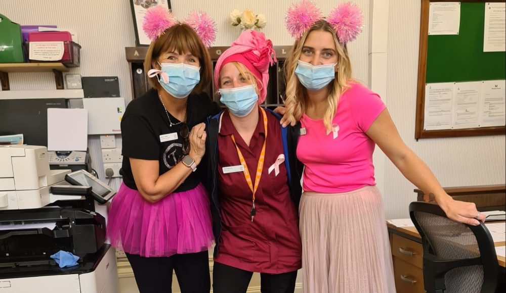 Staff members Karen Casey, Jana Kanova and Sophie Smith ‘Wear it Pink’ at RMBI Care Co. Home Zetland Court, in Bournemouth.