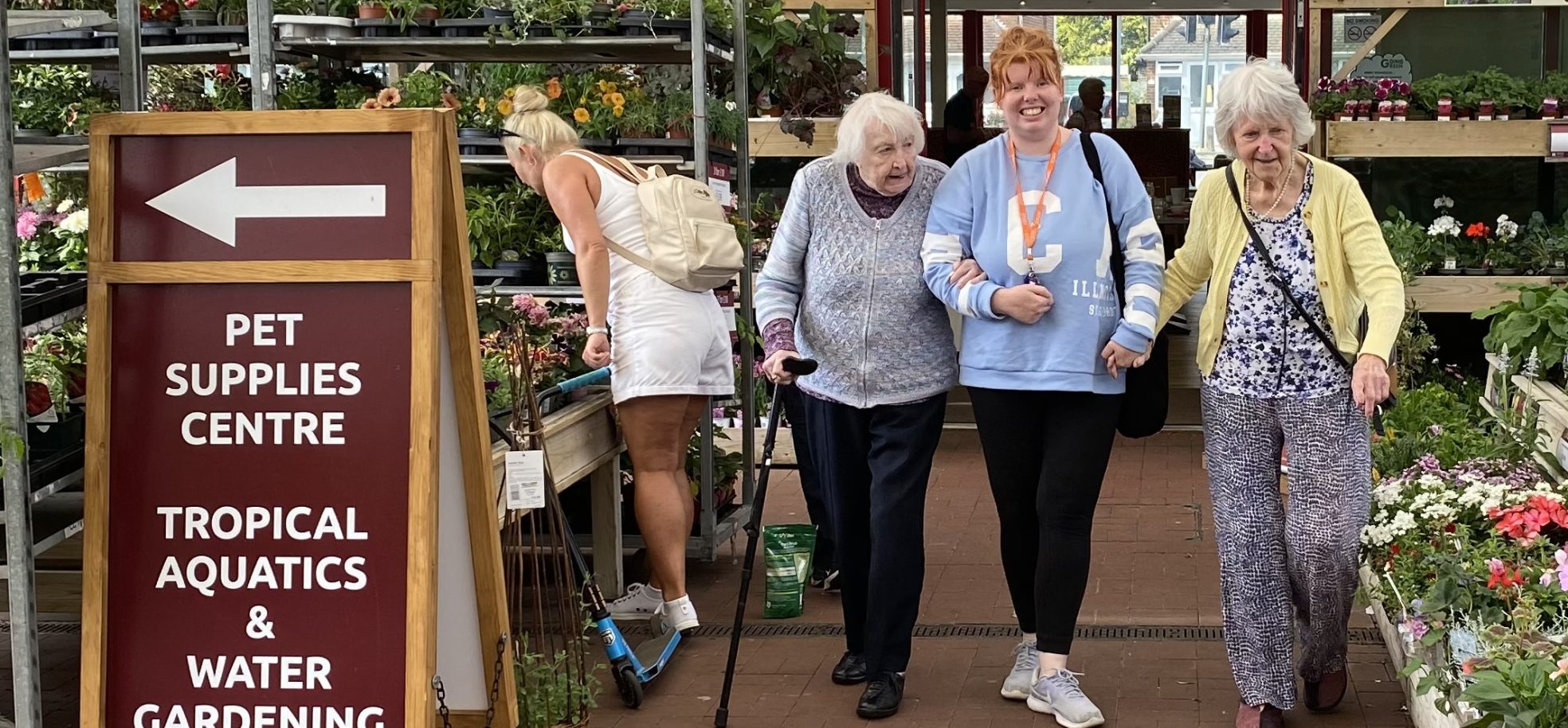 Resident Beryl Ward, Activities Coordinator Michelle Dyer and resident Joyce Drew access the local garden centre while looking for the most suitable plants for Barford Court.