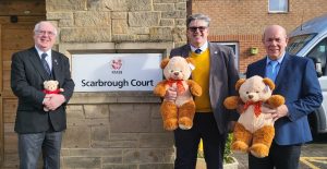 Alasdair Watson, John Thompson, Bill Morley from The Freemasons of Northumberland and Cumbria donate TLC teddies to residents at Scarbrough Court care home