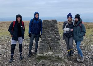 Harry Priestley House staff and friends on top of Ingleborough, the second highest mountain in the Yorkshire Dales