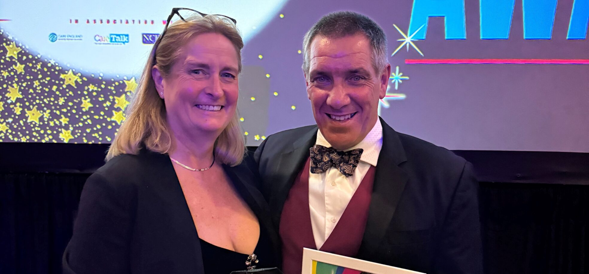 RMBI Care Co.’s Regional Manager for the central region and former Home Manager, Denise O’Brien, proudly holds up her trophy at the Great British Care Awards gala for the East of England, in Milton Keynes. Pictured here with her husband Neil O’Brien.