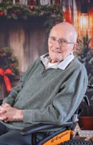 A male care home resident smiling.