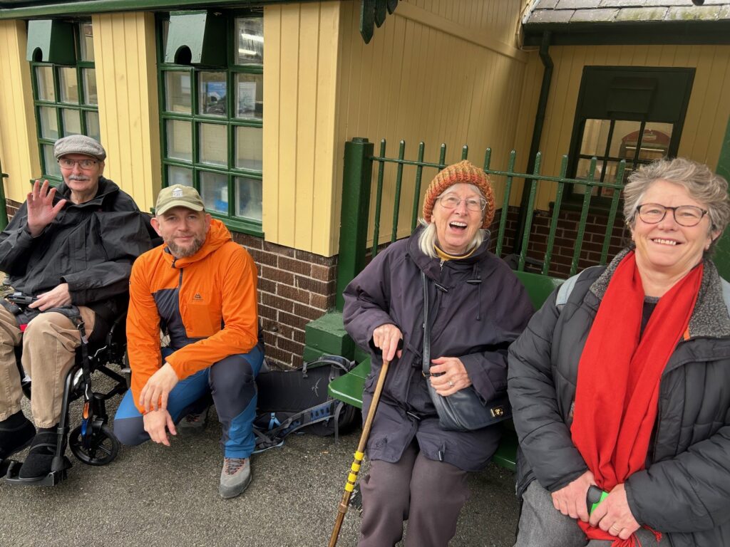 Queen Elizabeth Court residents Francis and Valerie along with her daughter Zoe and Dementia Lead Macej at Snowdon Mountain Railway.
