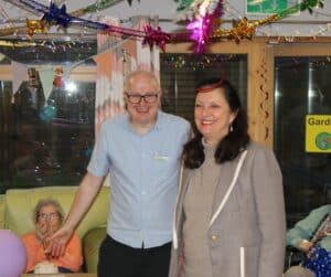 The care home's dementia lead with the councillor.