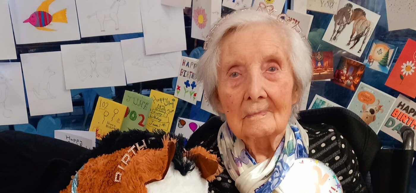 care home female resident celebrating her birthday