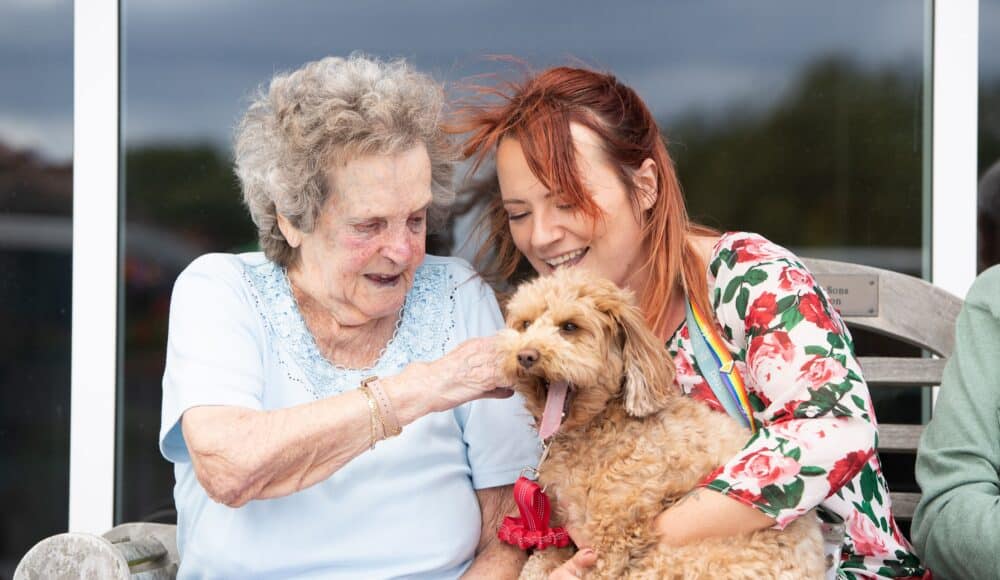 Resident Norah with Activities Coordinator Stacey Maule at RMBI Care Co. Home Scarbrough Court, in Cramlington, Northumberland