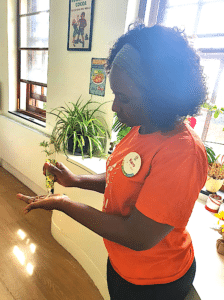 Care home staff using hand cream.