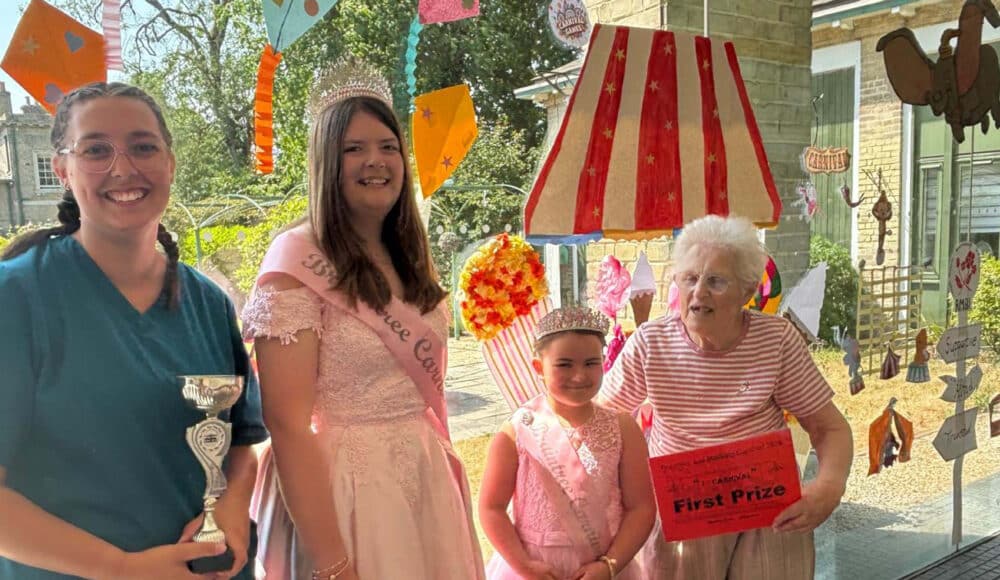 A staff member, a resident and the Queen and Princess.