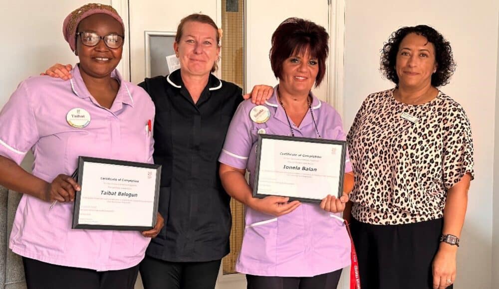 Taibat and Ionela receiving their certificates from Senior Team Leader Kat and Training Manager Naomi at Cornwallis Court, in Bury St Edmunds.