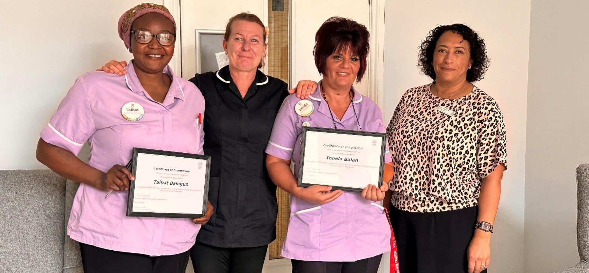 Taibat and Ionela receiving their certificates from Senior Team Leader Kat and Training Manager Naomi at Cornwallis Court, in Bury St Edmunds.